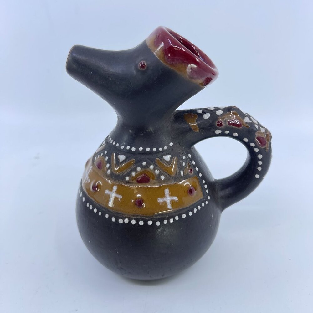 handcrafted vintage ceramic pitcher with tribal motifs & handle
